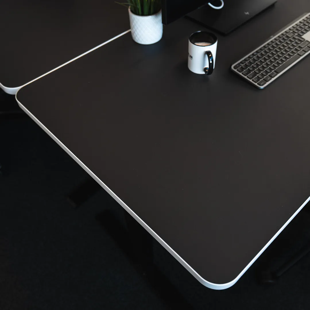 Anti-fingerprint and anti-scratch coating on LeetDesk desks
