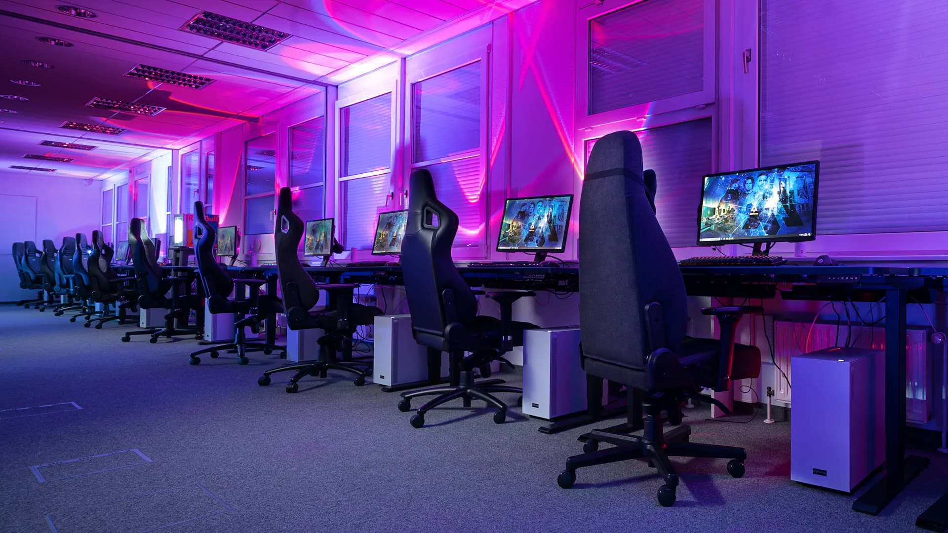 Row of electrically adjustable office desks from LeetDesk in the 1337Camp