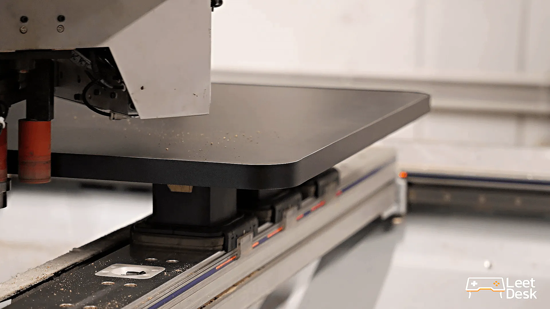 close up of a CNC tool cutting the leetdesk gaming desktop